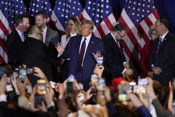 Republican presidential candidate former President Donald Trump arrives to speak at a primary election night party in Nashua, N.H., Tuesday, Jan. 23, 2024. (AP Photo/Pablo Martinez Monsivais)